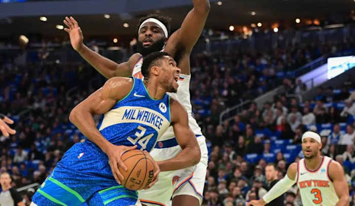 Mitchell Robinson guards Giannis Antetokounmpo during last week's quarterfinal